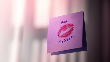 Love Yourself Concept. Note on the Mirror with a Lipstic Kiss Mark. Mental Health Remind and Practice to Start the Day with a Positive Mindの写真素材
