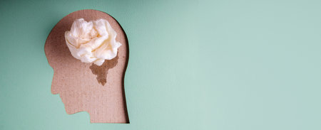 Mental Health Disorder Concept. Weak, Stressed Down Person. Negative Feeling. Depressed Emotional inside a Brain and Mind. Selective Focused on Wet Towel Paperの写真素材