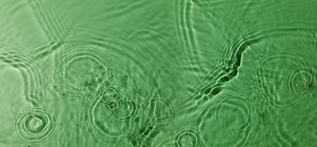Natural Green Texture. Nature Concept. Green Freshness Smooth Water Ripple. Background for Environmental and Sustainable Resources. Top Viewの写真素材