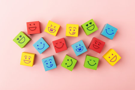 Group of Colourful Smiling Emoticon Diversity Face on Multi-colour Cube. Mind Mental Health. Happy Community. World Happiness, International Smiling Day. Table Top Viewの写真素材