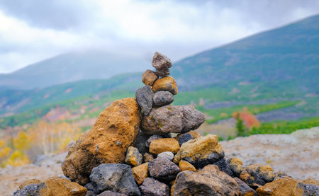 Faith and Spiritual Concept. People setting Natural Stone Stack in Mountainの写真素材