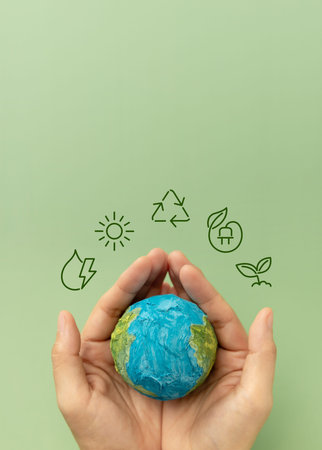 Earth in hands symbolizing sustainability, Recyling and Renewable, environmental care, Responsible...