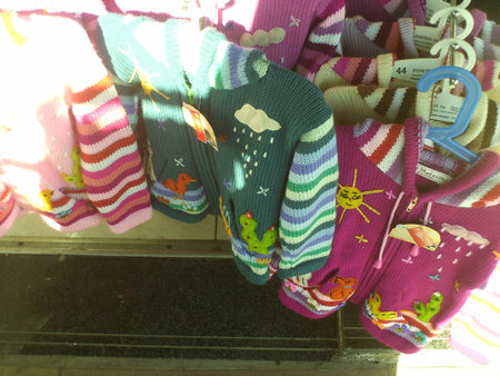Pair of colorful socks for sale in a souvenir shop.の写真素材