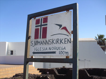 Signs at the entrance to the beach on the island of Lanzaroteの写真素材