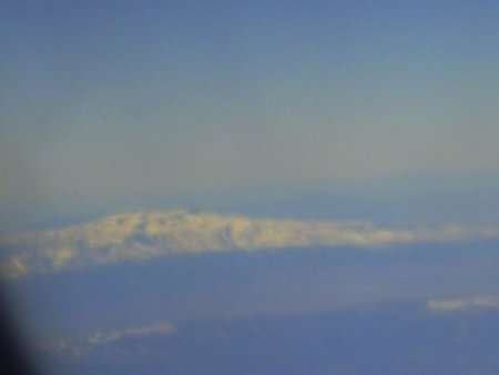 Clouds in the blue sky, view from the airplane window.の写真素材