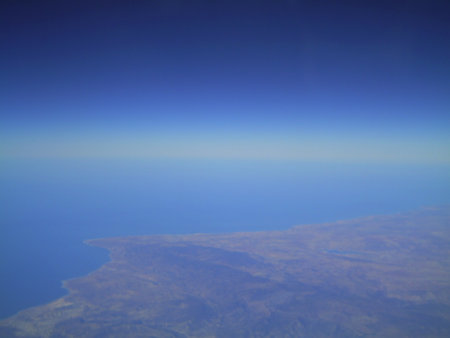 Aerial view of the blue sky and clouds from the plane.の写真素材