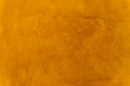 Grunge old vintage yellow cement background, with space for text or image