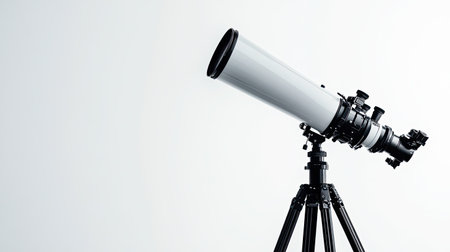 A sleek telescope mounted on a sturdy tripod, perfect for stargazing and exploring the wonders of the universe, designed for both amateurs and professionals.の素材