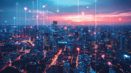 A stunning aerial view of a vibrant urban skyline at sunset, showcasing colorful lights and digital connections illuminating the cityの素材