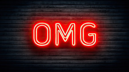 A vibrant neon sign displaying the letters OMG glows against a textured brick wall, creating an eye-catching visual perfect for urban themes and modern designs.の素材