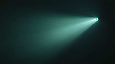 A solitary beam of light emerges from a flashlight in a dark space, creating a dramatic contrast. The image captures the essence of illumination and exploration.の素材