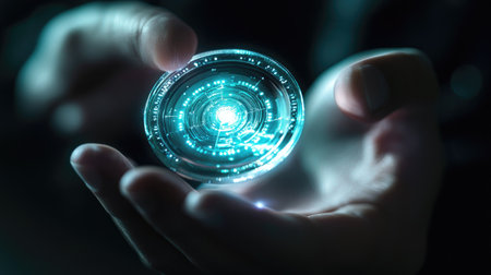 A person holds a glowing holographic interface in hands, showcasing futuristic technology and innovation. This image represents digital communication and advanced design.の素材