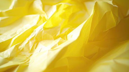 Vibrant yellow crumpled paper texture creates a dynamic and lively background. Perfect for design projects, presentations, and creative artworks.の素材