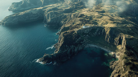 An enchanting aerial view showcasing a rugged coastal landscape, featuring dramatic cliffs meeting tranquil ocean waters, perfect for nature lovers and explorers.の素材