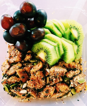 Clean breakfast consist of grape, kiwi, dried banana, seeds and nuts.の素材