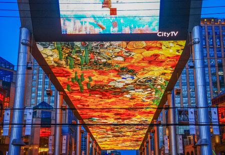Beijing, China - the so called "The Place" is a huge shopping mall which presents a 250 meters long screen on the top, and displays several shows every nightのeditorial素材