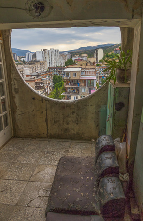Tbilis, Georgia - in the Georgian capital is possible to find many examples of soviet architecture and landmarks. Here in particular a residential building just outside the Old Townの写真素材