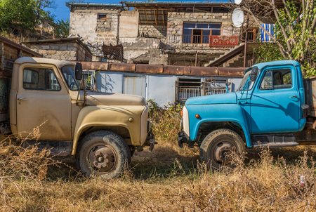 Nagorno-Karabakh region is since more than 25 years contended by Armenia and Azerbaijan. Here in the picture two old soviet trucksの写真素材