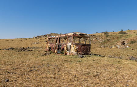 Yerevan surroundings, Armenia - abandoned cars and buildings are very easy to spot all around Armenia, giving the country a sort of post-atomic look sometimesの写真素材