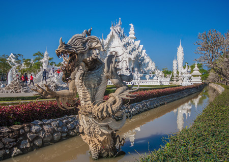 Chiang Rai, Thailand - in Thailand 95% of the population adheres to Buddhism. Here in particular the Wat Rong Khun temple, a modern temple which is the main landmark in Chiang Raiのeditorial素材