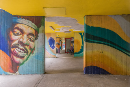 Berlin, Germany - street art and paintings are one of the most prominent landmarks in Berlin. Here in particular a fine example of the city's wall paintingのeditorial素材