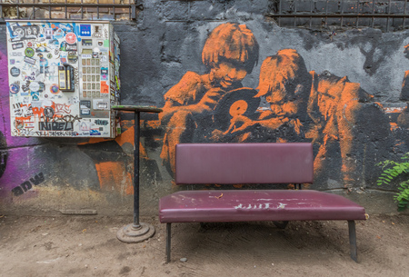 Berlin, Germany - street art and paintings are one of the most prominent landmarks in Berlin. Here in particular a fine example of the city's wall paintingのeditorial素材