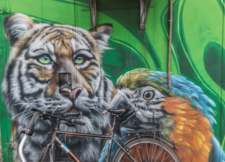 Berlin, Germany - street art and paintings are one of the most prominent landmarks in Berlin. Here in particular a fine example of the city's wall paintingのeditorial素材