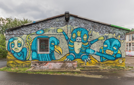 Berlin, Germany - street art and paintings are one of the most prominent landmarks in Berlin. Here in particular a fine example of the city's wall paintingのeditorial素材