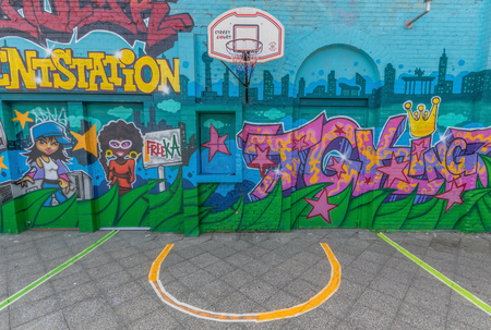 Berlin, Germany - street art and paintings are one of the most prominent landmarks in Berlin. Here in particular a fine example of the city's wall paintingのeditorial素材