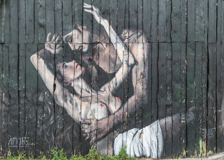 Berlin, Germany - street art and paintings are one of the most prominent landmarks in Berlin. Here in particular a fine example of the city's wall paintingのeditorial素材