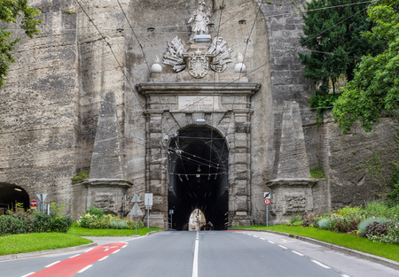 Salzburg, Austria -  a UNESCO World Heritage Site due to its wonderful baroque architecture, Salzburg presents a lot of tunnels which are often made underneath palaces and residential buildingsのeditorial素材