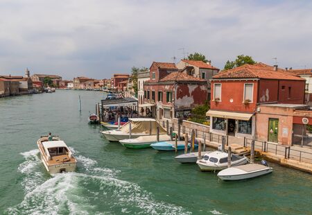Burano, Italy - Burano is a small island and, with its colorful buildings and houses, one of the most beautiful treasures of Venice Lagoon. Here in the picture a detail of the villageのeditorial素材