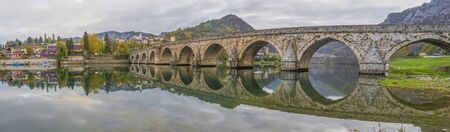 Right at the border with Serbia, Visegrad is a quiet and wonderful city, worldwide famous for the Mehmed PaÅ¡a Sokolovic Bridge, a Unesco World Heritage siteの写真素材