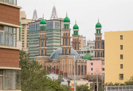 Urumqi, China - capital of the Xinjiang Uygur Autonomous Region, Urumqi displays a wonderful balance between islamic and chinese culture. Here in particular one of the numerous mosques in the Old Townのeditorial素材