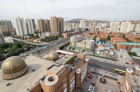 Urumqi, China - capital of the Xinjiang Uygur Autonomous Region, Urumqi displays wonderful landmarks. Here in particular the city's skylineのeditorial素材