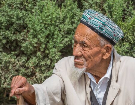Kashgar, China - almost 85% of Kashgar inhabitants are Uyghurs, a minority Turkic ethnic group culturally affiliated with Central Asia populations. Here in particular an example of Kashgar Uyghursのeditorial素材