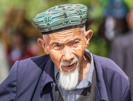 Kashgar, China - almost 85% of Kashgar inhabitants are Uyghurs, a minority Turkic ethnic group culturally affiliated with Central Asia populations. Here in particular an example of Kashgar Uyghursのeditorial素材
