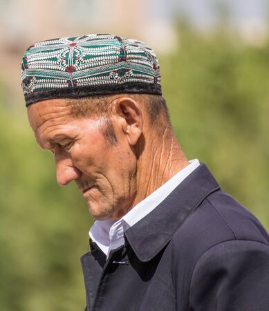 Kashgar, China - almost 85% of Kashgar inhabitants are Uyghurs, a minority Turkic ethnic group culturally affiliated with Central Asia populations. Here in particular an example of Kashgar Uyghursのeditorial素材