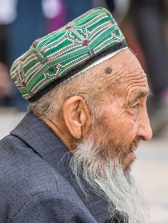 Kashgar, China - almost 85% of Kashgar inhabitants are Uyghurs, a minority Turkic ethnic group culturally affiliated with Central Asia populations. Here in particular an example of Kashgar Uyghursのeditorial素材
