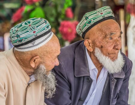 Kashgar, China - almost 85% of Kashgar inhabitants are Uyghurs, a minority Turkic ethnic group culturally affiliated with Central Asia populations. Here in particular an example of Kashgar Uyghursのeditorial素材