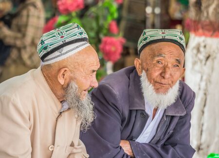 Kashgar, China - almost 85% of Kashgar inhabitants are Uyghurs, a minority Turkic ethnic group culturally affiliated with Central Asia populations. Here in particular an example of Kashgar Uyghursのeditorial素材