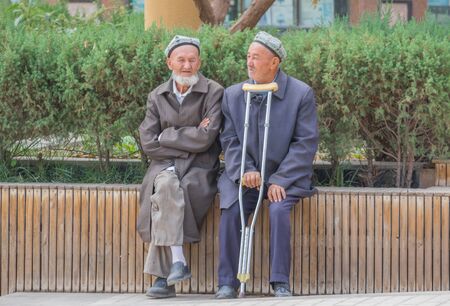 Kashgar, China - almost 85% of Kashgar inhabitants are Uyghurs, a minority Turkic ethnic group culturally affiliated with Central Asia populations. Here in particular an example of Kashgar Uyghursのeditorial素材