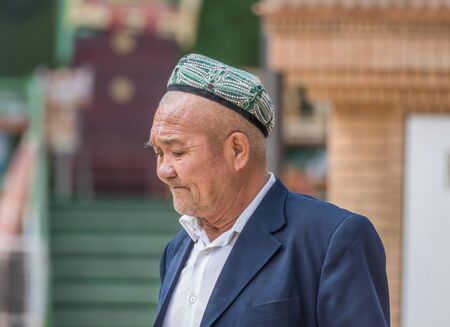 Kashgar, China - almost 85% of Kashgar inhabitants are Uyghurs, a minority Turkic ethnic group culturally affiliated with Central Asia populations. Here in particular an example of Kashgar Uyghursのeditorial素材