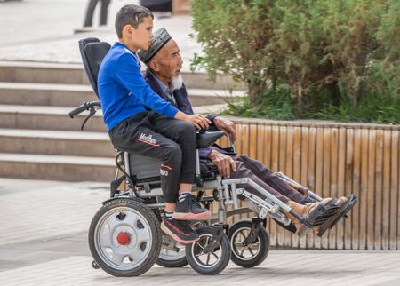 Kashgar, China - almost 85% of Kashgar inhabitants are Uyghurs, a minority Turkic ethnic group culturally affiliated with Central Asia populations. Here in particular an example of Kashgar Uyghursのeditorial素材