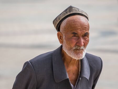 Kashgar, China - almost 85% of Kashgar inhabitants are Uyghurs, a minority Turkic ethnic group culturally affiliated with Central Asia populations. Here in particular an example of Kashgar Uyghursのeditorial素材
