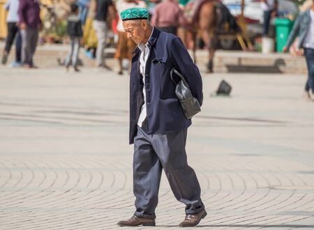 Kashgar, China - almost 85% of Kashgar inhabitants are Uyghurs, a minority Turkic ethnic group culturally affiliated with Central Asia populations. Here in particular an example of Kashgar Uyghursのeditorial素材
