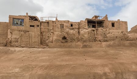 Kashgar, China - even if almost totally demolished in favor of the "new" Old Town, more safe, clean and less chaotic, in Kashgar is still possible to spot few remaining buildings of the original Old Townの写真素材