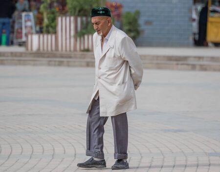 Kashgar, China - almost 85% of Kashgar inhabitants are Uyghurs, a minority Turkic ethnic group culturally affiliated with Central Asia populations. Here in particular an example of Kashgar Uyghursのeditorial素材