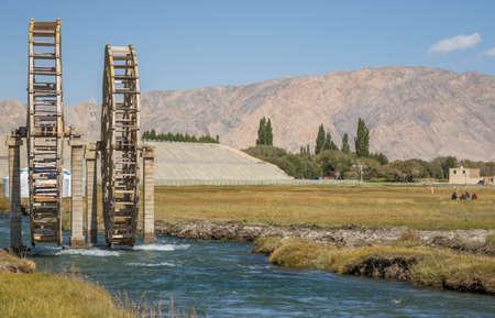Tashkurgan, China - located 3,500m above the sea level, and last city before the border with Pakistan, Tashkurgan is a modern town with the signs of a rural past, like the watermill in the pictureのeditorial素材