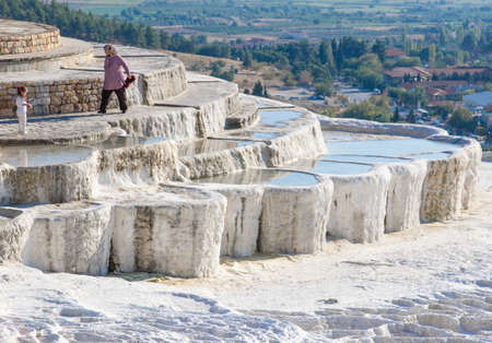 Pamukkale, Turkey - one of the most famous attractions of Turkey, and a Unesco World Heritage site, Pamukkale is visited by millions each year. Here in particular the white travertine terracesのeditorial素材